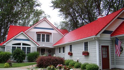 black metal roofs on red houses|red roof house colour schemes.